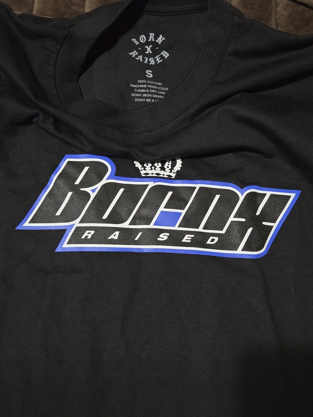 BORN X RAISED Black Tee with Blue-Trim Logo